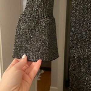 Loft trumpet sleeve rubbed sweater dress, Black and silver detail with v neck.